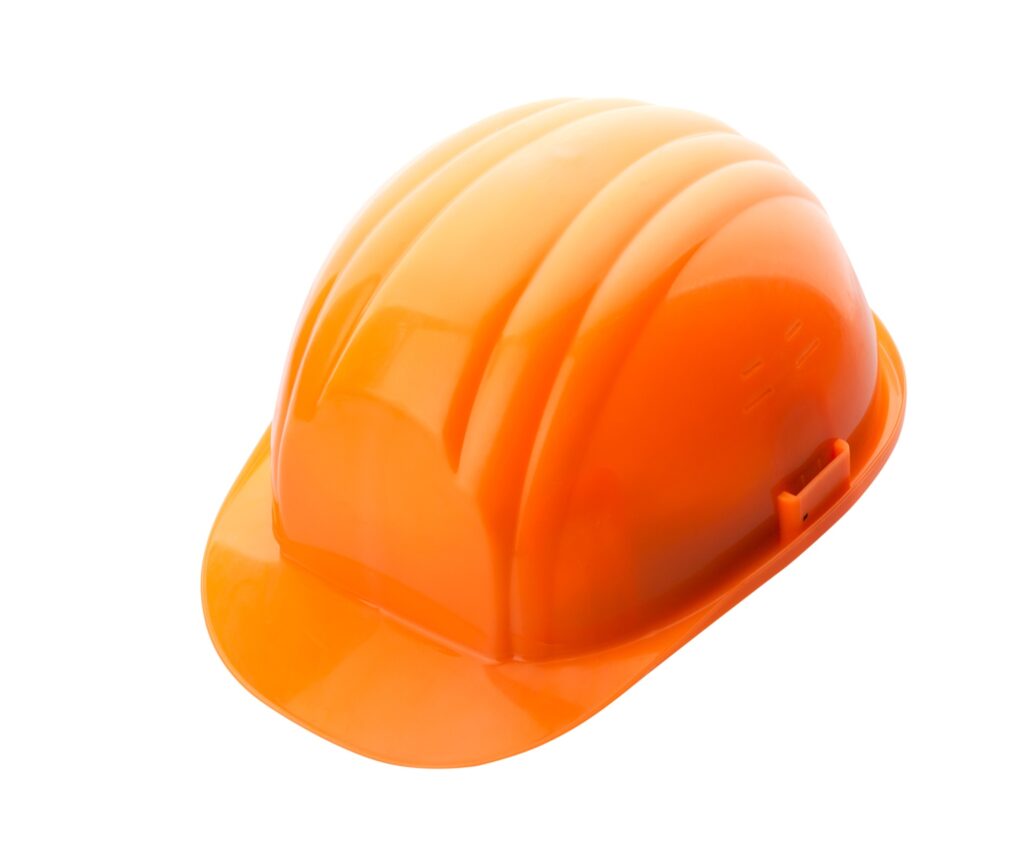 Orange helmet on white